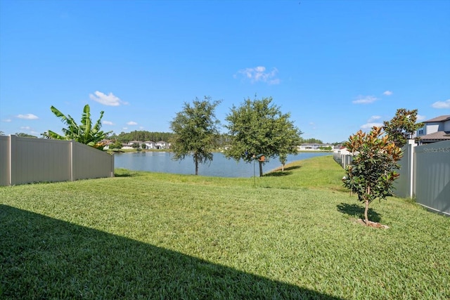 view of yard with a water view