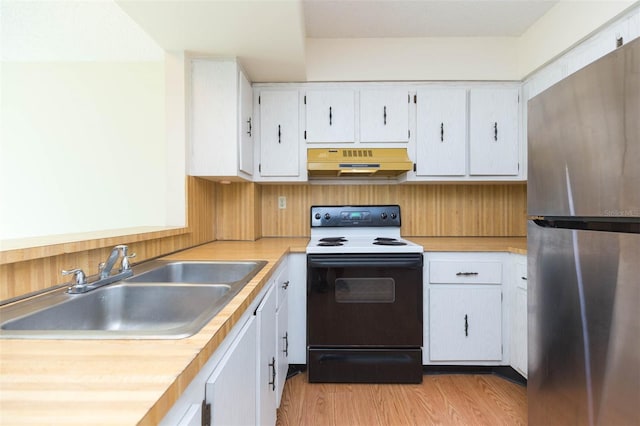 kitchen with light hardwood / wood-style floors, white electric stove, sink, white cabinets, and stainless steel refrigerator