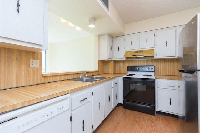 kitchen with sink, white cabinetry, white appliances, and light hardwood / wood-style flooring