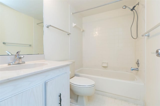 full bathroom with tiled shower / bath, vanity, toilet, and tile floors