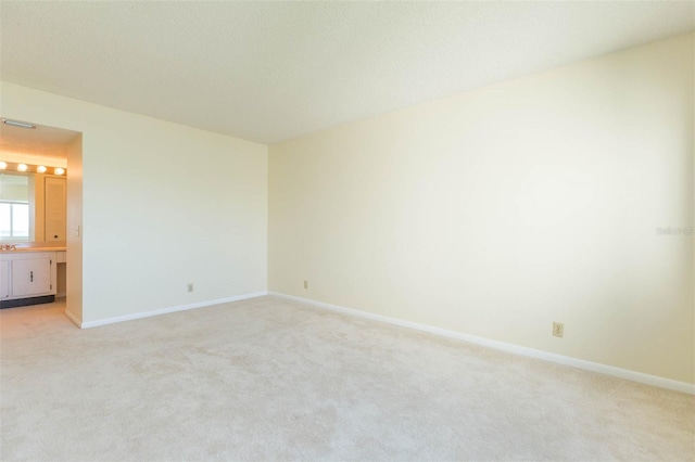 spare room with carpet floors