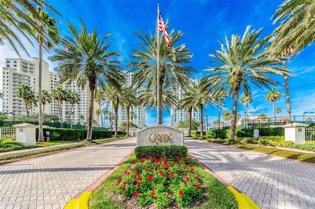 view of property's community featuring decorative driveway