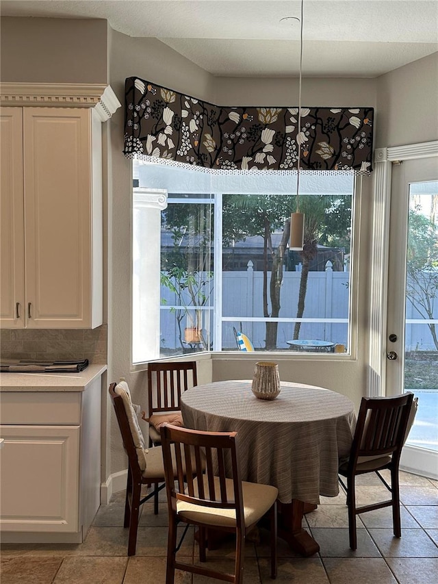 view of tiled dining space