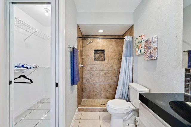 bathroom with toilet, tile patterned flooring, vanity, and a shower with shower curtain