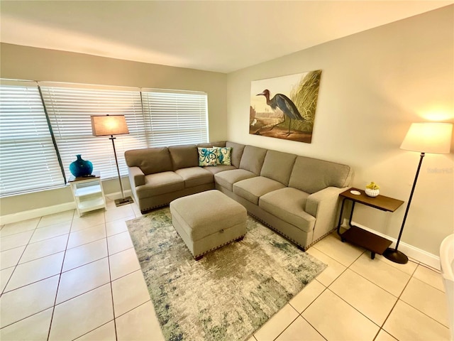 tiled living room featuring a wealth of natural light