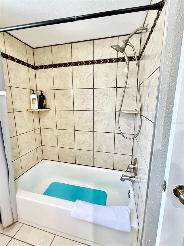 bathroom featuring tile patterned floors and shower / bath combination with curtain