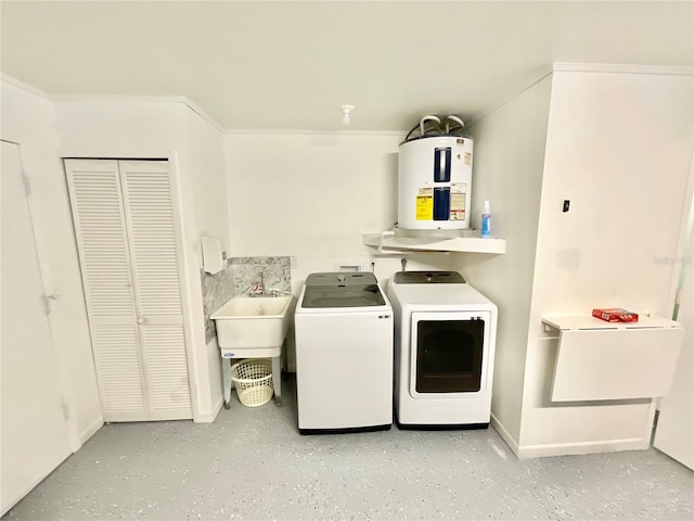 laundry area with washer and clothes dryer, sink, electric water heater, and ornamental molding