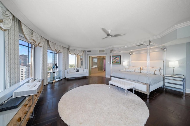 bedroom with dark parquet floors, ceiling fan, and ornamental molding