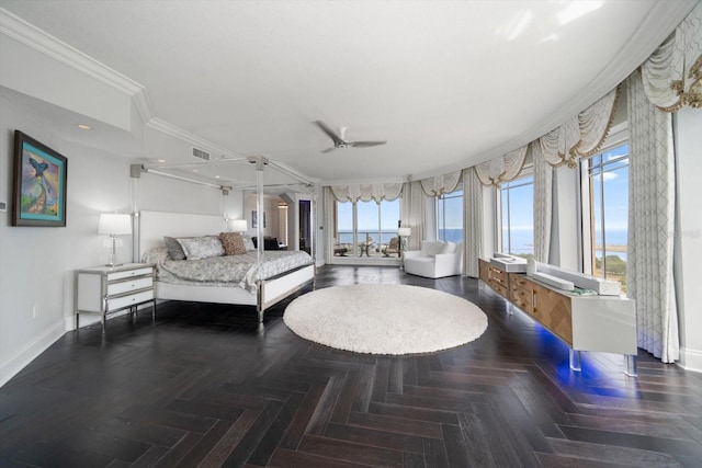 bedroom with dark parquet flooring, ceiling fan, and ornamental molding