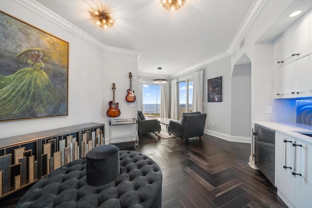 sitting room with dark parquet floors and ornamental molding