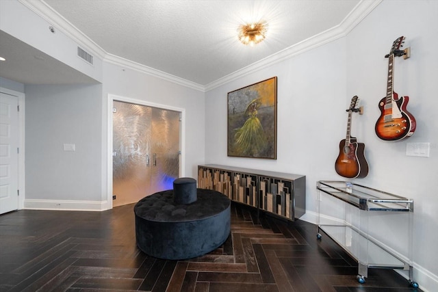 living area with a textured ceiling, dark parquet flooring, and crown molding