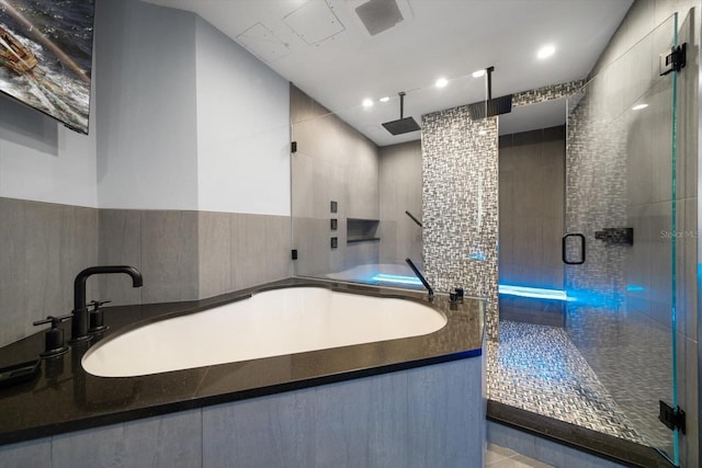 bathroom featuring an enclosed shower