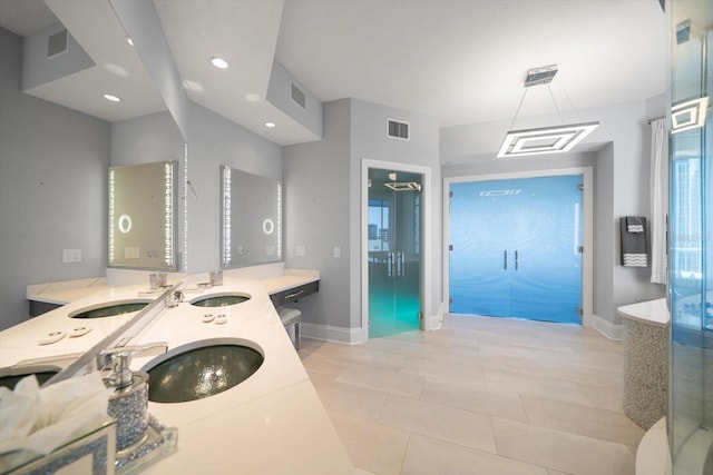 bathroom featuring vanity and tile patterned floors