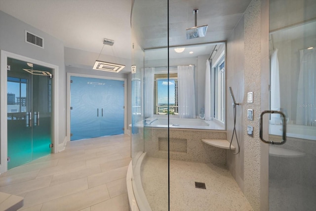 bathroom with tile patterned flooring and plus walk in shower