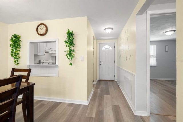 entrance foyer with light hardwood / wood-style flooring