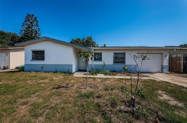 ranch-style house featuring a garage