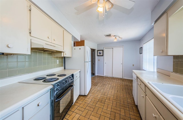 kitchen with a textured ceiling, white appliances, sink, tasteful backsplash, and ceiling fan