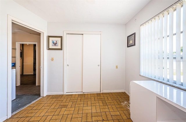 unfurnished bedroom with a closet