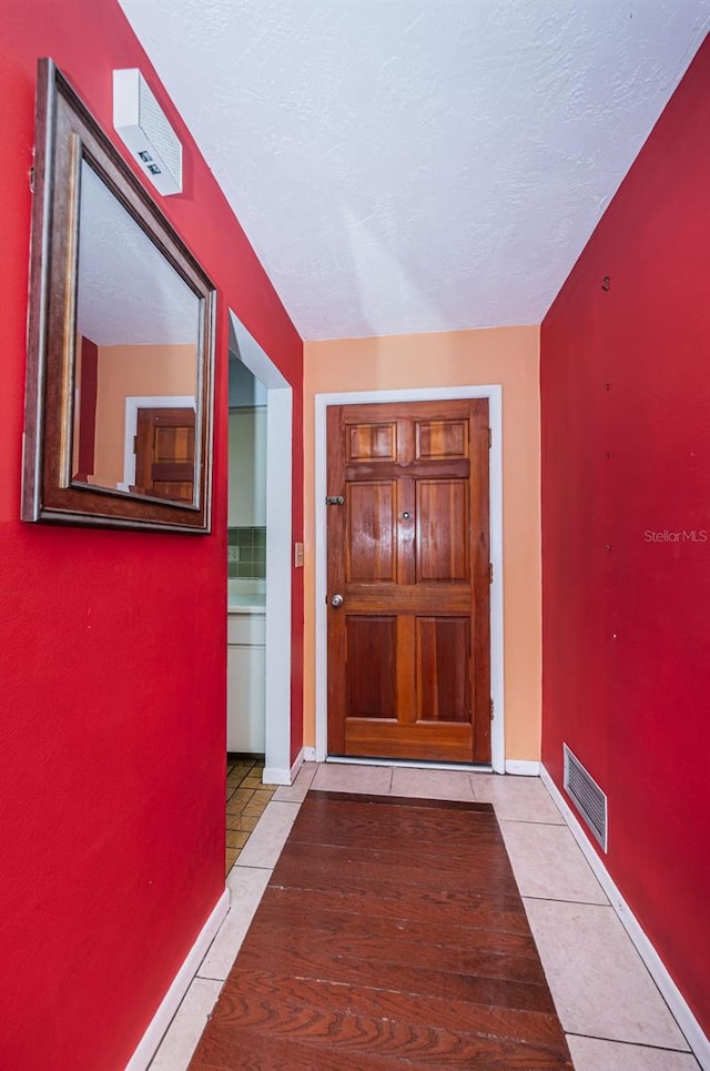 interior space featuring tile floors