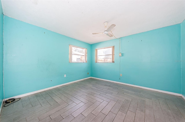 unfurnished room featuring ceiling fan