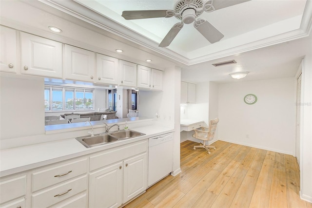 kitchen with dishwasher, sink, light hardwood / wood-style floors, white cabinets, and ornamental molding