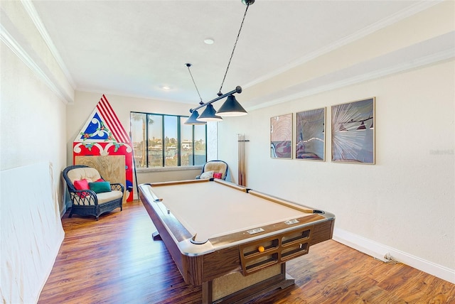 game room featuring hardwood / wood-style flooring, ornamental molding, and billiards