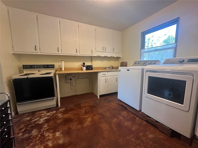 clothes washing area with washer and clothes dryer and sink