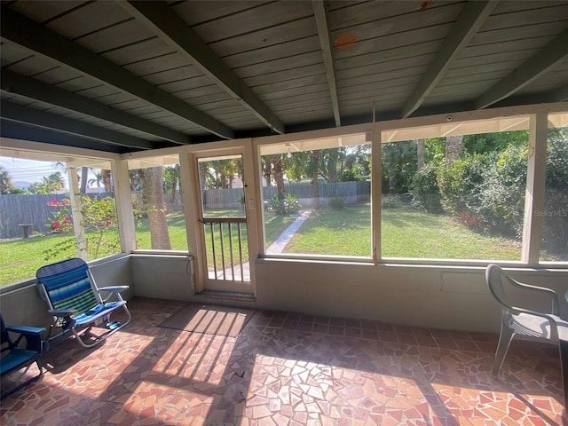 unfurnished sunroom featuring plenty of natural light