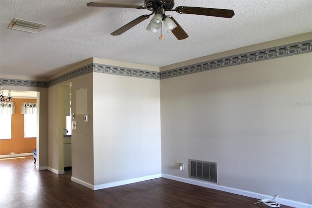 unfurnished room with ceiling fan, a textured ceiling, and hardwood / wood-style flooring