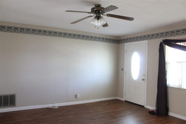 entrance foyer with dark wood-type flooring and ceiling fan