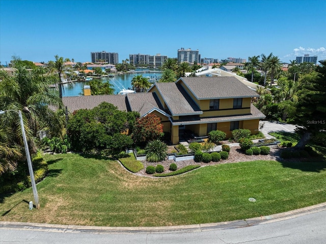 drone / aerial view featuring a water view