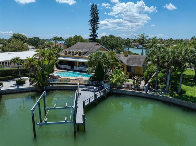 dock area featuring a water view