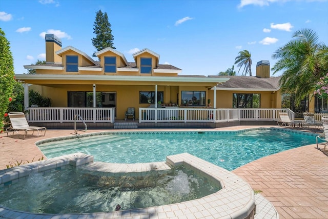 view of swimming pool featuring a patio