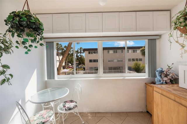 interior space featuring light tile patterned floors