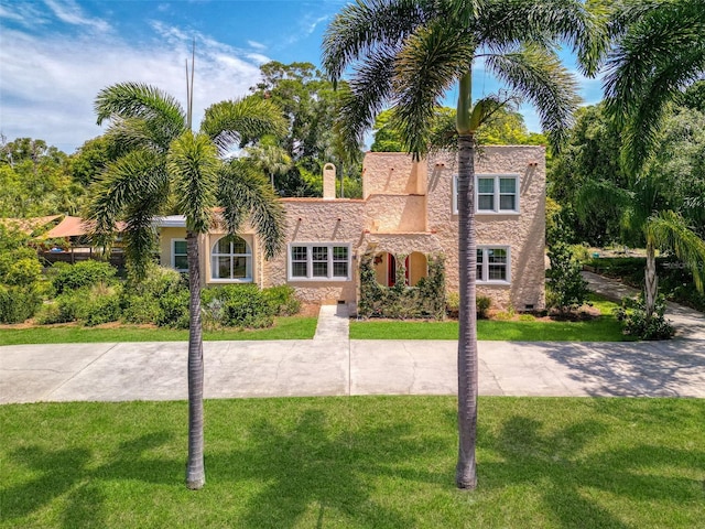 view of front of house with a front lawn