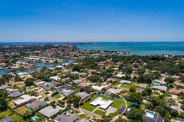 bird's eye view featuring a residential view and a water view