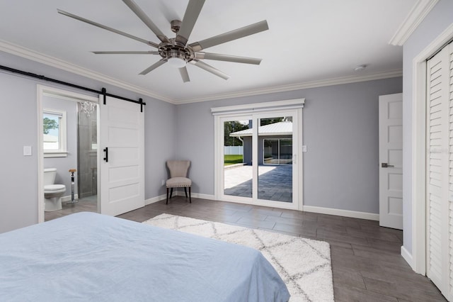 bedroom with access to exterior, a barn door, multiple windows, and ornamental molding