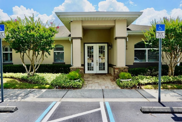 entrance to property featuring french doors