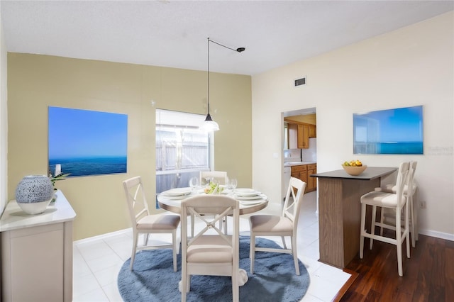 dining room featuring light hardwood / wood-style flooring