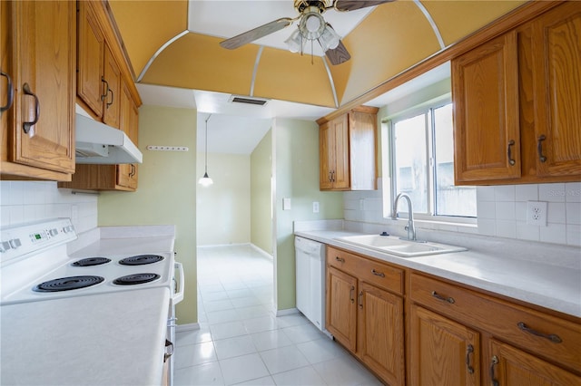 kitchen featuring ceiling fan, sink, decorative light fixtures, white appliances, and decorative backsplash