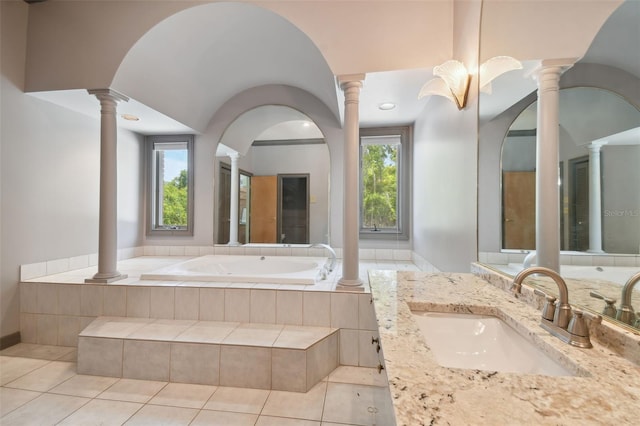 bathroom featuring tile floors and a wealth of natural light