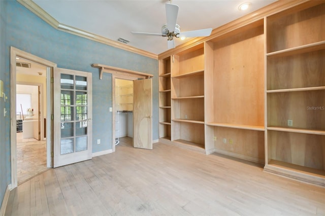 interior space featuring ornamental molding, ceiling fan, and light wood-type flooring