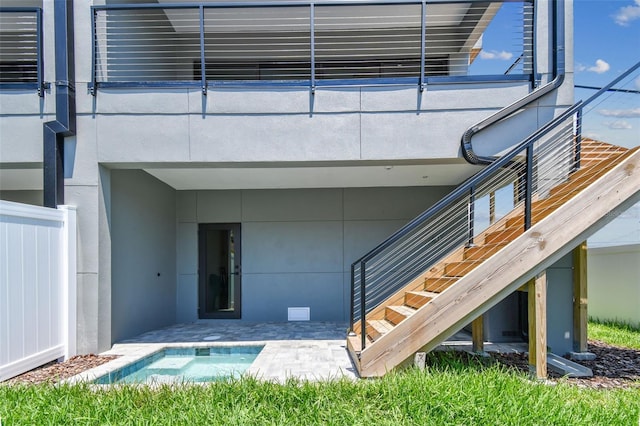 doorway to property with a patio and a swimming pool