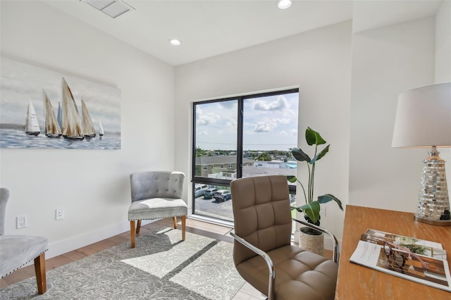 office space with hardwood / wood-style floors