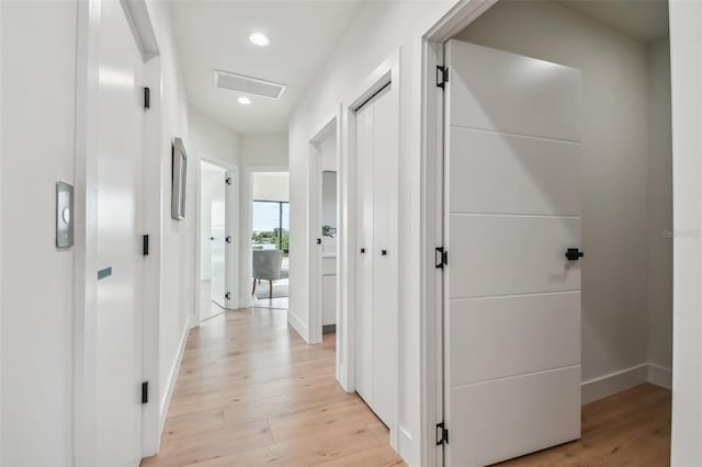 hallway featuring light hardwood / wood-style floors