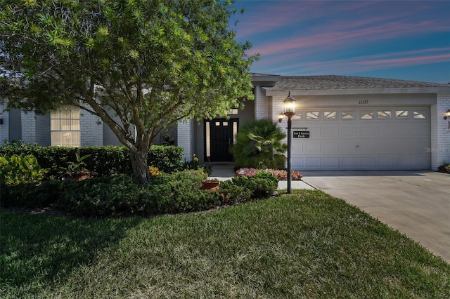 view of front of home with a garage