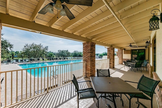 view of patio featuring a community pool