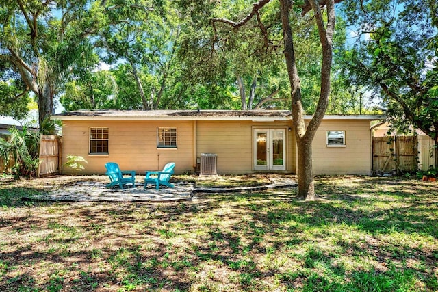 6490 34th Ave N, Saint Petersburg, FL 33710 - rear view of house with central AC