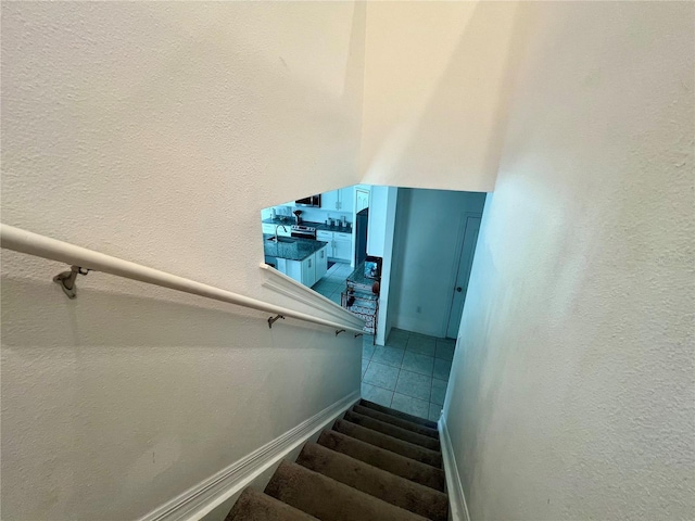 staircase featuring sink