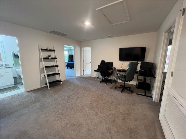 home office featuring a wealth of natural light and carpet